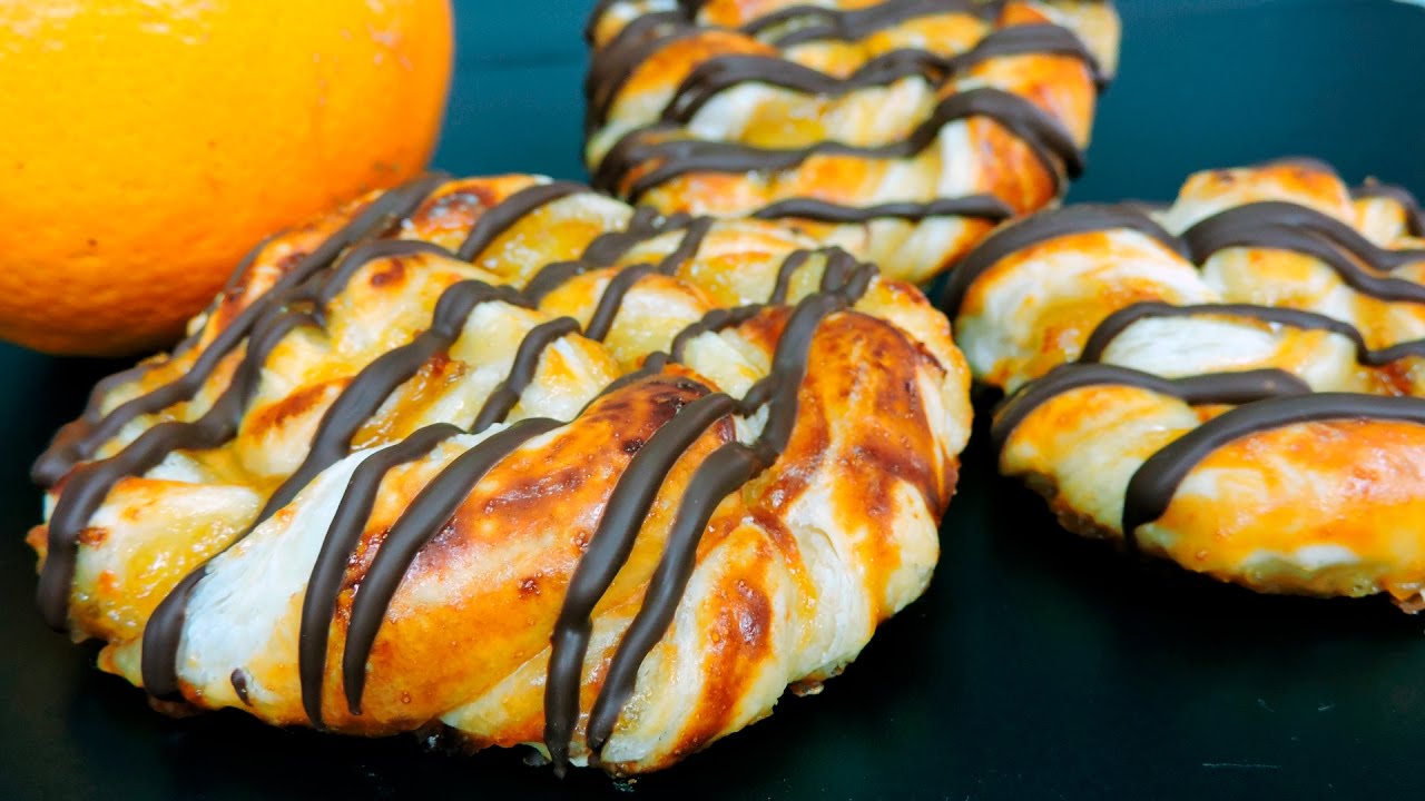 Caracolas de hojaldre con naranja y chocolate